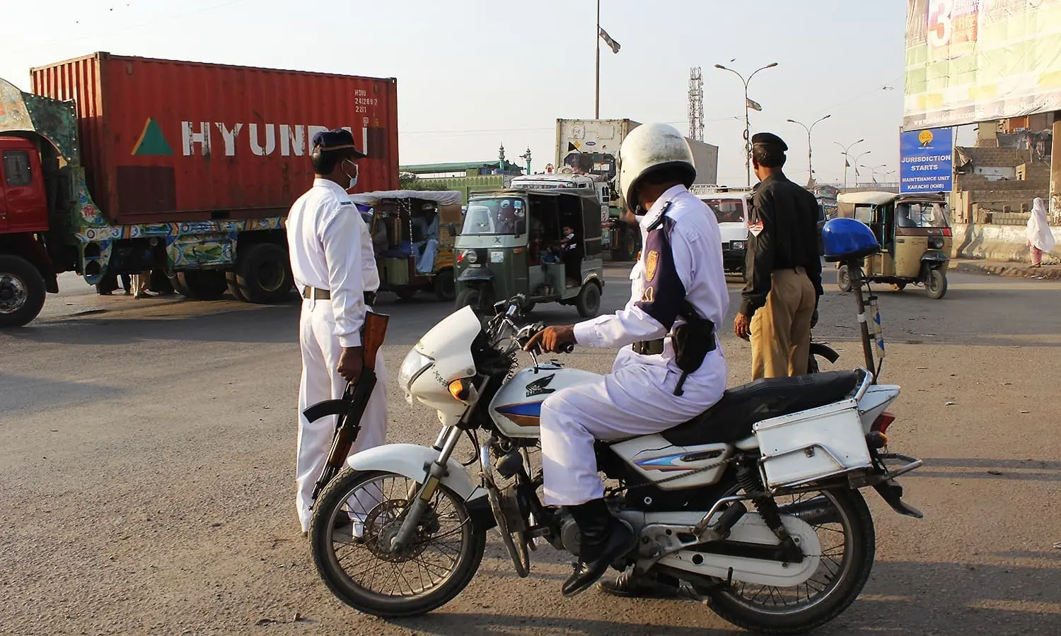 Karachi Traffic Police performing their duties at a main thoroughfare of the port city. &mdash; File Photo