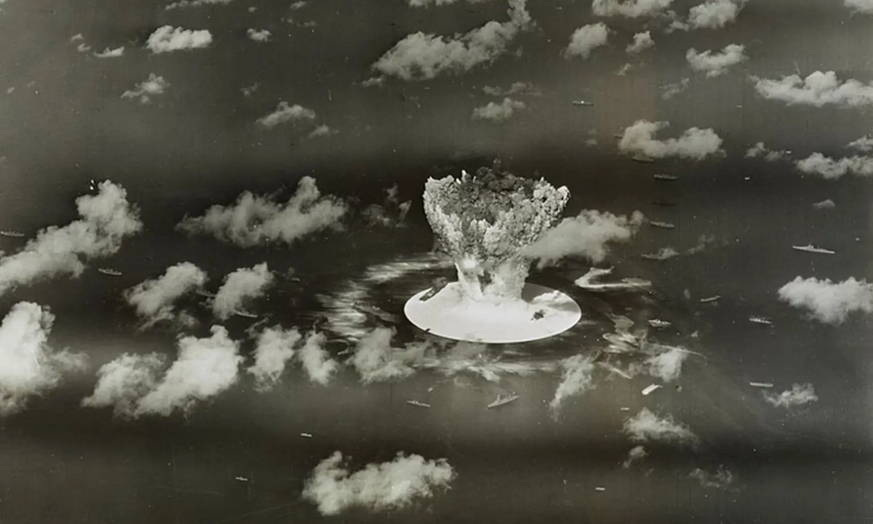 A mushroom cloud rises with ships below during Operation Crossroads nuclear weapons test on Bikini Atoll, Marshall Islands in this 1946 handout provided by the US Library of Congress. &mdash; US Library of Congress via Reuters/File