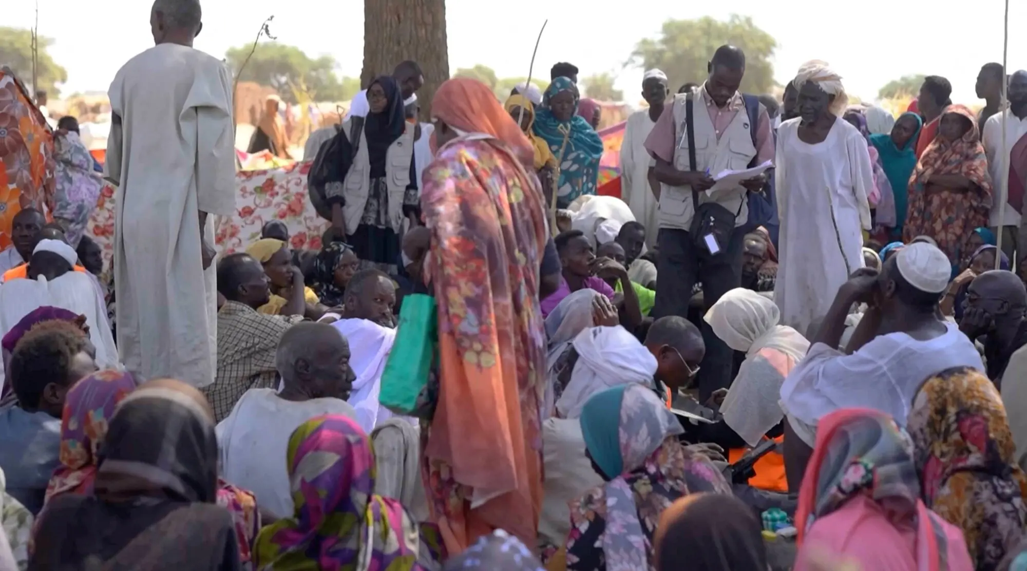 Displaced Sudanese gather after fleeing the Darfur town of Al-Fasher, in Tawila, Sudan, on October 29. – Reuters