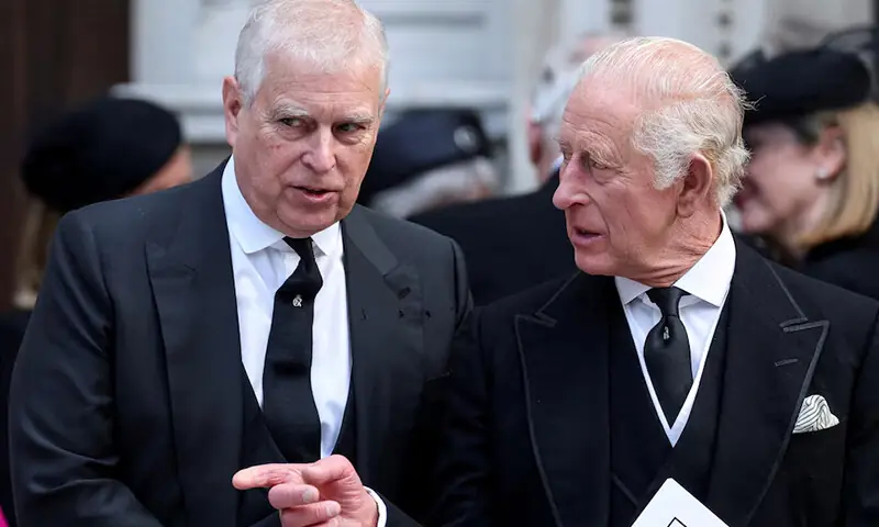 Britain&rsquo;s Prince Andrew speaks with King Charles III as they leave Westminster Cathedral at the end of the Requiem Mass in London, the UK on September 16. &mdash; Reuters/File