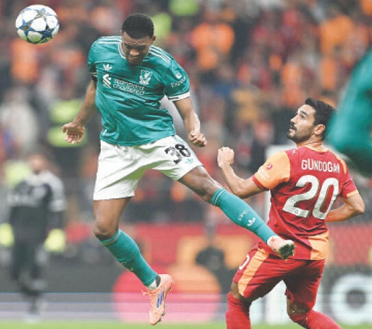  ISTANBUL: Liverpool&rsquo;s Ryan Gravenberch (L) heads the ball in the air in front of Galatasaray&rsquo;s Ilkay Gundogan during their match at Ali Sami Yen Spor Kompleksi.&mdash;AFP 