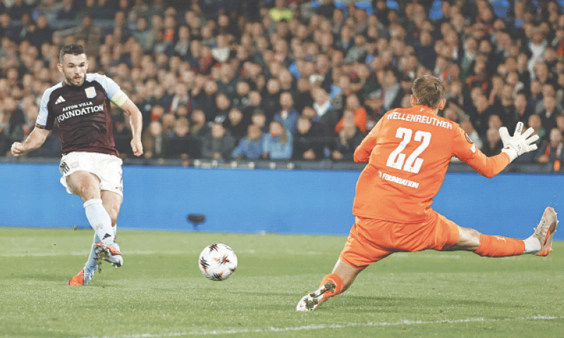 ROTTERDAM: Aston Villa&rsquo;s John McGinn shoots to score against Feyenoord during their Europa League match at Feyenoord Stadium.&mdash;Reuters