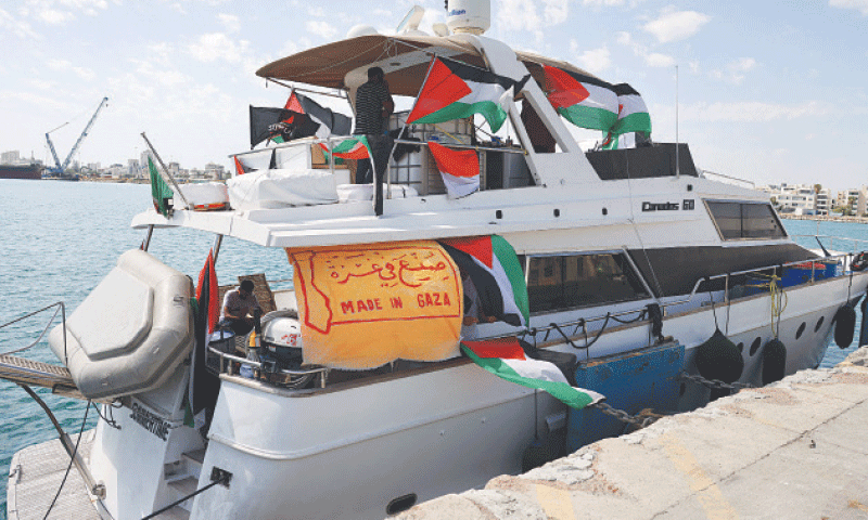 PEOPLE gather on a boat from the Global Sumud Flotilla, which had been carrying aid to Gaza until it was intercepted by Israel, docked in the port of Larnaca in Cyprus.&mdash;Reuters