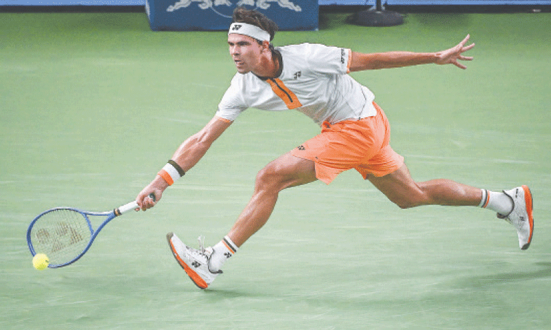 GERMANY&rsquo;S Daniel Altmaier hits a return to Jannik Sinner of Italy during their Shanghai Masters match on Saturday.&mdash;AFP