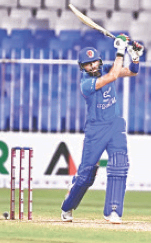 SHARJAH: Afghanistan opener Ibrahim Zadran plays a shot during the second Twenty20 International against Bangladesh at the Sharjah Cricket Stadium on Friday. Bangladesh won the match by two wickets to take an unassailable 2-0 series lead. Pacer Shoriful Islam (1-13) restricted Afghanistan to 147-5 before Bangladesh chased the target despite Azmatullah Omarzai&rsquo;s 4-23.&mdash;Courtesy ACB