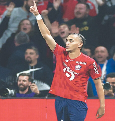 VILLENEUVE-D’ASCQ: Lille’s Ethan Mbappe celebrates after scoring against Paris St Germain during their Ligue 1 match at Decathlon Arena Stade Pierre-Mauroy.—Reuters