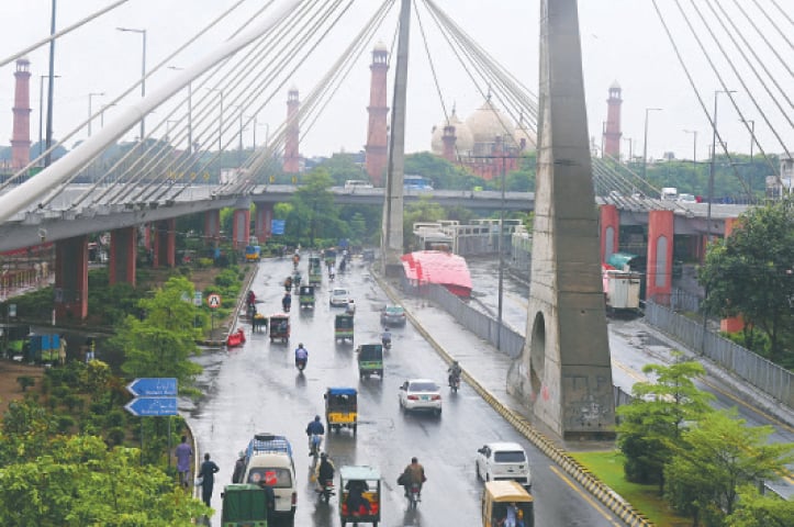 Ravi Road during the first winter rain spell that has brought the temperature down. — White Star / M. Arif