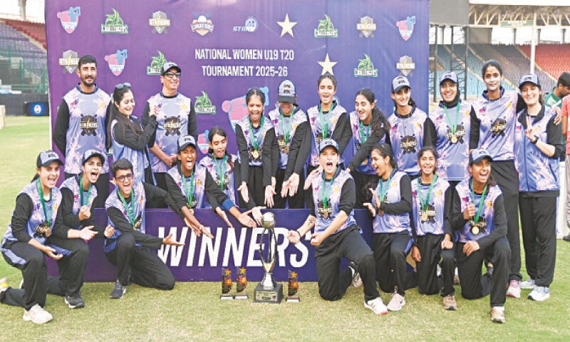 STRIKERS&rsquo; players celebrate with the National Women&rsquo;s Under-19 T20 Tournament trophy after beating Conquerors in the final at the National Bank Stadium on Wednesday.&mdash;Courtesy PCB