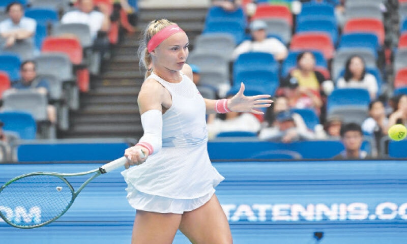 SLOVAKIA&rsquo;S Rebecca Sramkova hits a return to Aryna Sabalenka of Belarus during their Wuhan Open match on Wednesday.&mdash;AFP