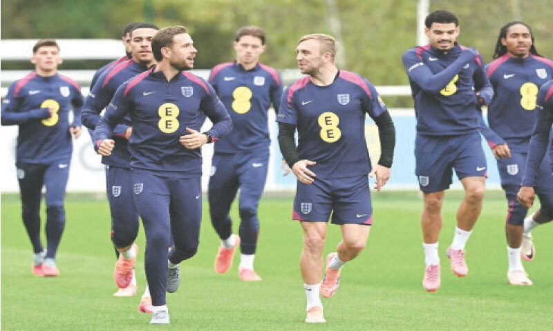 BURTON-UPON-TRENT: England players in action during a training session at St George’s Park on Wednesday.—AFP BURTON-UPON-TRENT: England players in action during a training session at St George’s Park on Wednesday.—AFP