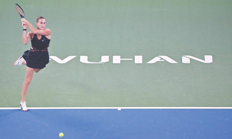 ARYNA Sabalenka of Belarus hits a return against Russia’s Liudmila Samsonova during their Wuhan Open round-of-16 match on Thursday.—AFP ARYNA Sabalenka of Belarus hits a return against Russia’s Liudmila Samsonova during their Wuhan Open round-of-16 match on Thursday.—AFP