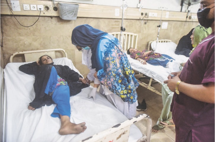 Medical staff attend to a patient in the emergency ward of the Civil Hospital. &mdash; Fahim Siddiqi / white Star
