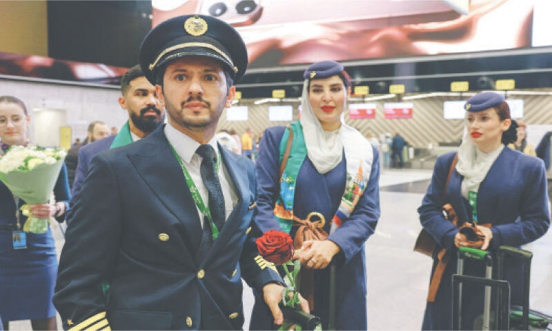 CREW members of Saudia look on during a welcoming ceremony at Moscow&rsquo;s Sheremetyevo international airport. &mdash;Reuters