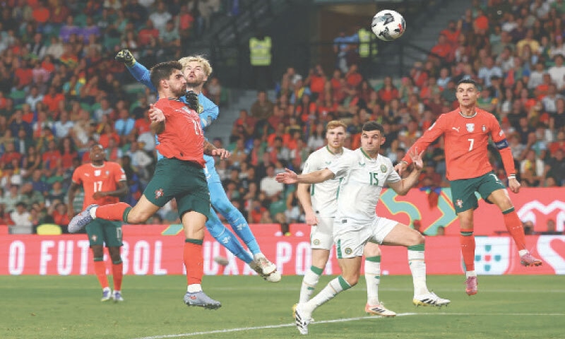 LISBON: Portugal&rsquo;s Ruben Neves (L) scores during the World Cup qualifier against Ireland at Estadio Jose Alvalade.&mdash;Reuters