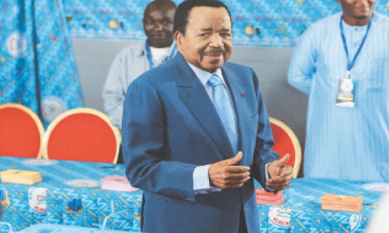 Cameroonian President Paul Biya reacts after casting his ballot during the presidential election on Sunday.—Reuters Cameroonian President Paul Biya reacts after casting his ballot during the presidential election on Sunday.—Reuters