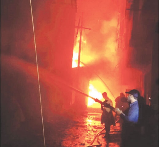  Firefighters battle raging flames in the Sher Shah area.&mdash;PPI 
