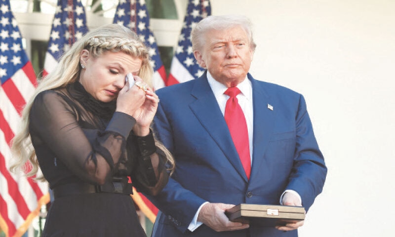 ERIKA Kirk, wife of Charlie Kirk, wipes away her tears during the ceremony.&mdash;Reuters