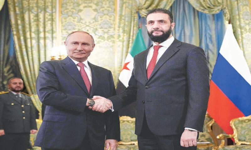 Russian President Vladimir Putin and Syria&rsquo;s interim president Ahmed al-Sharaa shake hands during their meeting at the Grand Kremlin Palace in Moscow.&mdash;AFP
