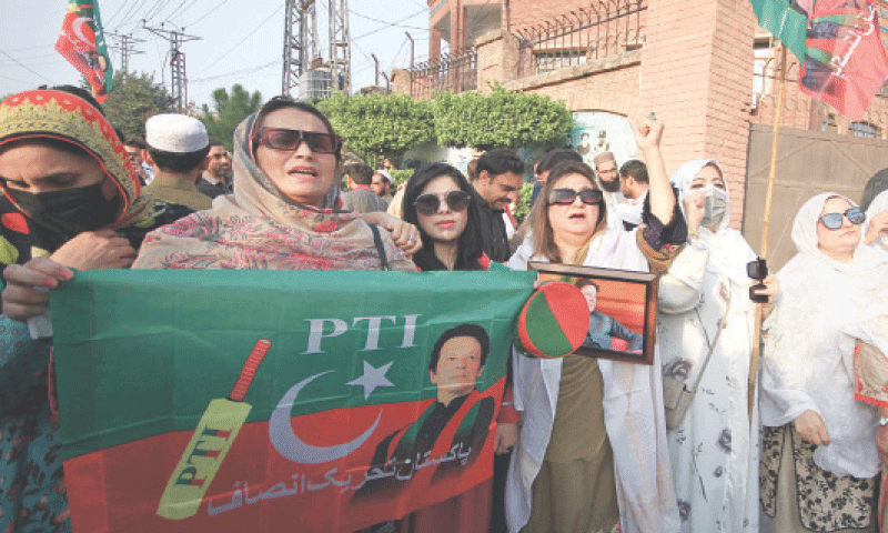 Pakistan Tehreek-i-Insaf members stage a protest in Peshawar on Friday. &mdash; White Star