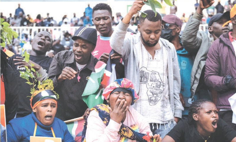 MOURNERS vent their emotions during the funeral of Kenya’s opposition leader Raila Odinga in Nairobi.—AFP MOURNERS vent their emotions during the funeral of Kenya’s opposition leader Raila Odinga in Nairobi.—AFP