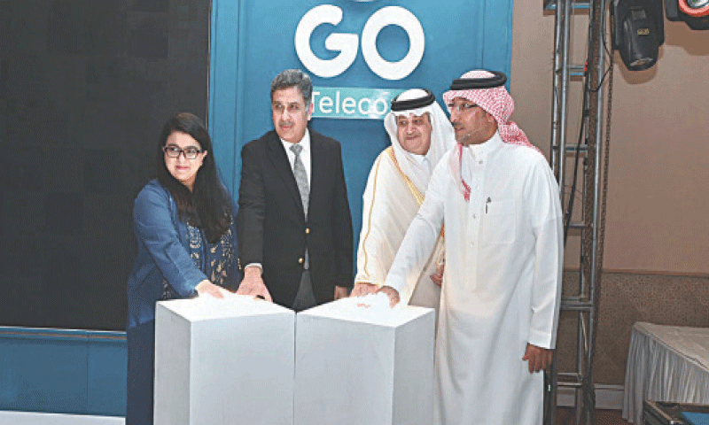 Minister for IT and Telecommunication Shaza Fatima Khawaja, Saudi Ambassador Nawaf bin Said Al-Malki, National Coordinator SIFC Lt Gen Sarfaraz Ahmed and GO Group CEO Yahya bin Saleh Al-Mansour jointly press the button to inaugurate the GO AI Hub in Islamabad on Saturday. &mdash; APP
