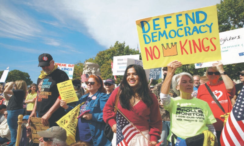 Washington: Demonstrators participate in a ‘No Kings’ day of protest against US President Donald Trump’s policies. From New York to San Francisco, millions of Americans hit the streets on Saturday to voice their anger over the president’s move to send troops to Democratic-led states and other measures which they condemned as ‘authoritarian’ .—AFP Washington: Demonstrators participate in a ‘No Kings’ day of protest against US President Donald Trump’s policies. From New York to San Francisco, millions of Americans hit the streets on Saturday to voice their anger over the president’s move to send troops to Democratic-led states and other measures which they condemned as ‘authoritarian’ .—AFP