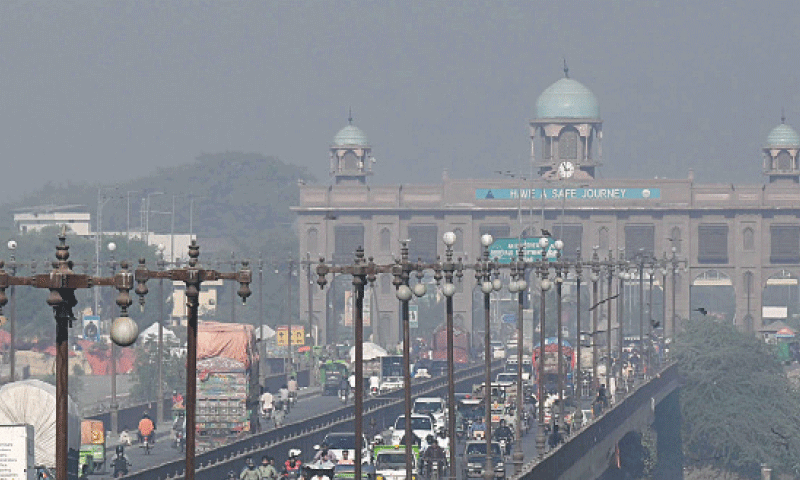 A view of dense smog near Saggian. &mdash; White Star / M Arif