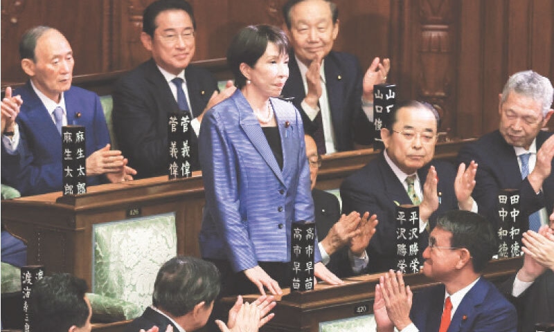 TOKYO: Lawmakers applaud Sanae Takaichi, leader of the ruling Liberal Democratic Party, after she became the first woman to be elected prime minister of Japan.—Reuters TOKYO: Lawmakers applaud Sanae Takaichi, leader of the ruling Liberal Democratic Party, after she became the first woman to be elected prime minister of Japan.—Reuters