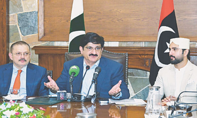Chief Minister Syed Murad Ali Shah speaks, alongside ministers Sharjeel Memon and Sardar Muhammad Bux Mahar, at the press conference.&mdash;PPI