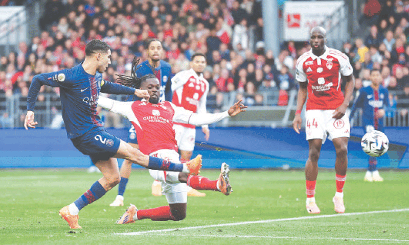 BREST: Paris St-Germain&rsquo;s Achraf 
Hakimi (L) shoots to score during the Ligue 1 match against Brest at Stade Francis-Le Ble.&mdash;Reuters