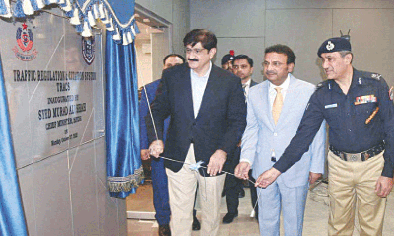 Chief Minister Syed Murad Ali Shah inaugurates, alongside Home Minister Zia Lanjar and IGP Ghulam Nabi Memon, the Traffic Regulation and Citation System (TRACS) at the Central Police Office.&mdash;APP