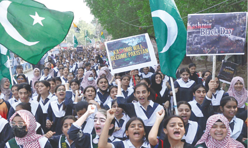 HYDERABAD: Schoolchildren stage a rally to mark Kashmir Black Day.&mdash;PPI