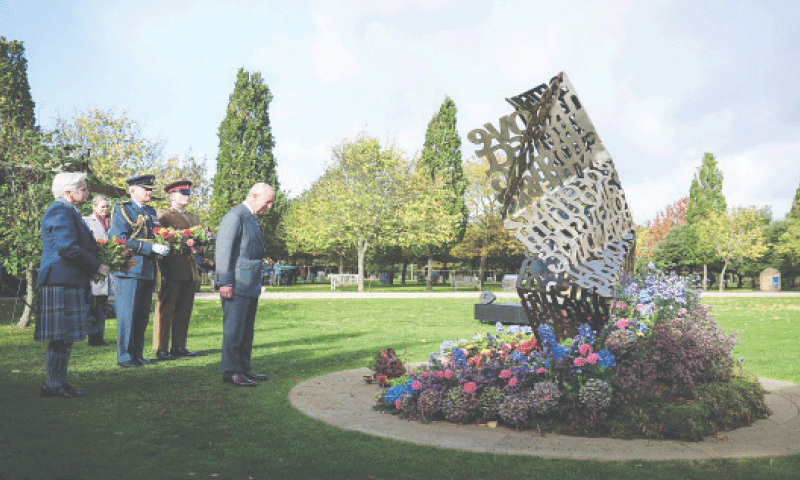 BRITAIN&rsquo;S King Charles lays flowers at an LGBT memorial before attending the LGBT armed forces dedication ceremony.&mdash;AFP