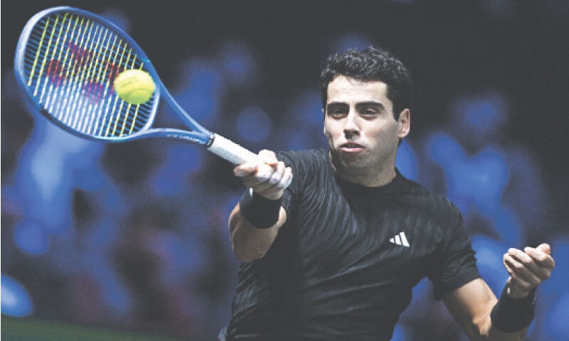 SPAIN&rsquo;S Jaume Munar plays a forehand return to Daniil Medvedev of Russia during their Paris Masters first-round match at the Paris La Defense Arena on Tuesday.&mdash;AFP