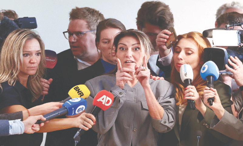 Dilan Yesilgoz, who heads the Peoples Party for Freedom and Democracy, speaks to media at the Dutch parliament.—Reuters Dilan Yesilgoz, who heads the Peoples Party for Freedom and Democracy, speaks to media at the Dutch parliament.—Reuters