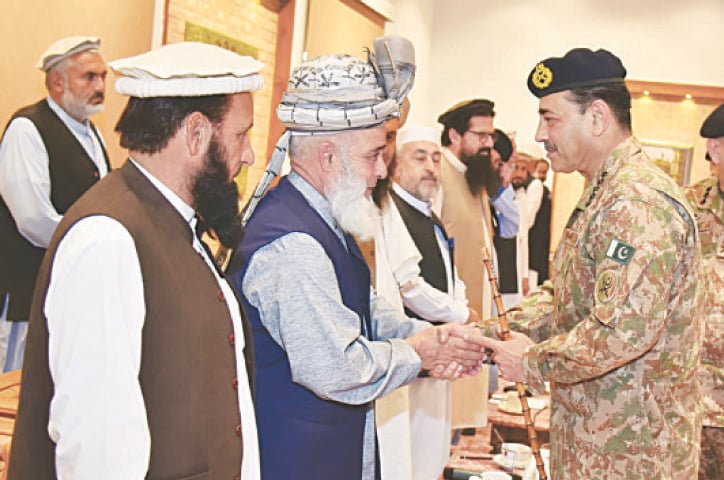 Chief of Army Staff Field Marshal Syed Asim Munir meets tribal elders in Peshawar.&mdash;PPI