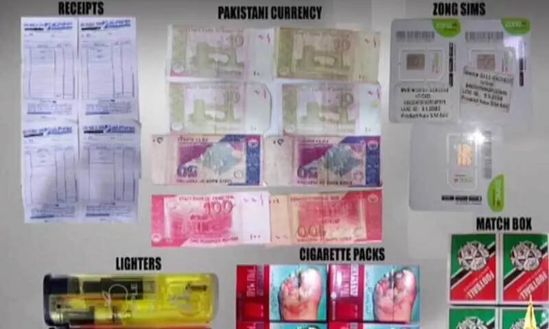 This screengrab shows some items allegedly recovered from Ijaz Mallah, a Pakistani fisherman arrested by security agencies in October 2025. — DawnNewsTV
