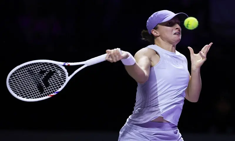 Poland&rsquo;s Iga Swiatek hits a return during the WTA Finals match against Madison Keys of the US in Riyadh on Nov 1, 2025. &mdash; Reuters