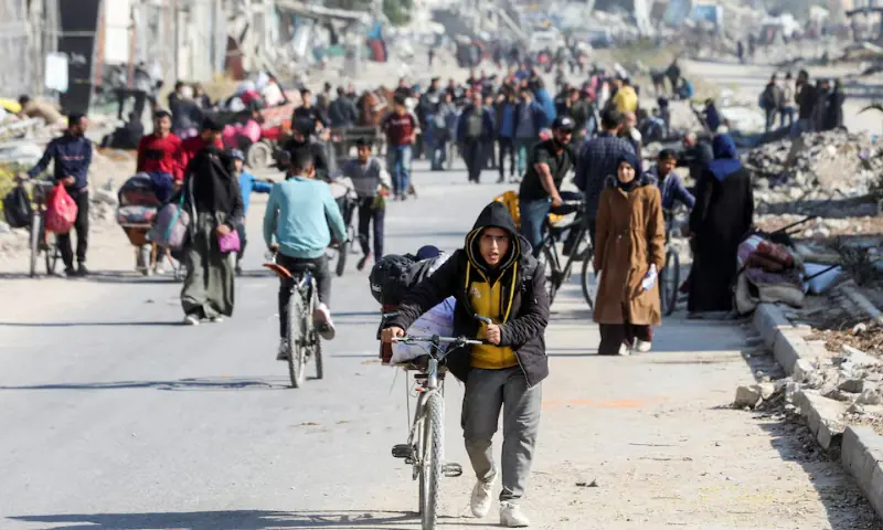 Displaced Palestinians make their way after fleeing the northern part of Gaza amid an Israeli military operation, in Gaza City, on November 12, 2024. &mdash; Reuters/File