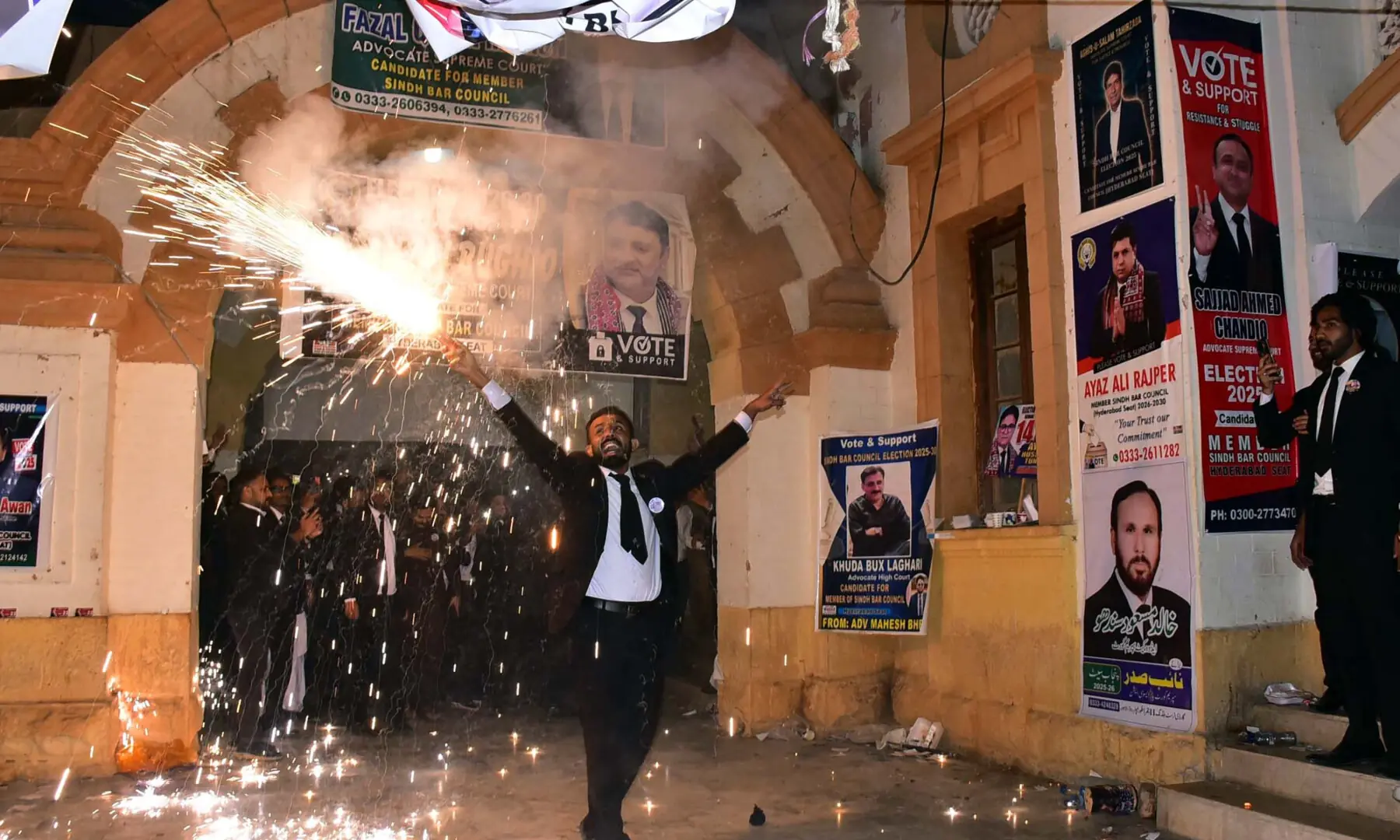 LAWYERS celebrate the victory of their candidates at Hyderabad District & Sessions Court after announcement of unofficial results of Sindh Bar Council election on Sunday.—PPI LAWYERS celebrate the victory of their candidates at Hyderabad District & Sessions Court after announcement of unofficial results of Sindh Bar Council election on Sunday.—PPI
