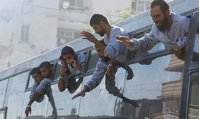 Freed Palestinian prisoners look out of a bus after they were released by Israel as part of a hostages-prisoners swap and a ceasefire deal between Hamas and Israel, in Khan Younis in the southern Gaza Strip, October 13, 2025. — Reuters /Mahmoud Issa Freed Palestinian prisoners look out of a bus after they were released by Israel as part of a hostages-prisoners swap and a ceasefire deal between Hamas and Israel, in Khan Younis in the southern Gaza Strip, October 13, 2025. — Reuters /Mahmoud Issa