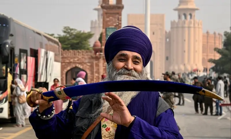  An Indian Sikh pilgrim arrives in Pakistan after crossing the India-Pakistan Wagah border in Wagah on November 4, 2025, on the eve of celebrations marking the birth anniversary of Guru Nanak, founder of Sikhism. &mdash; AFP/ Narinder Nanu 