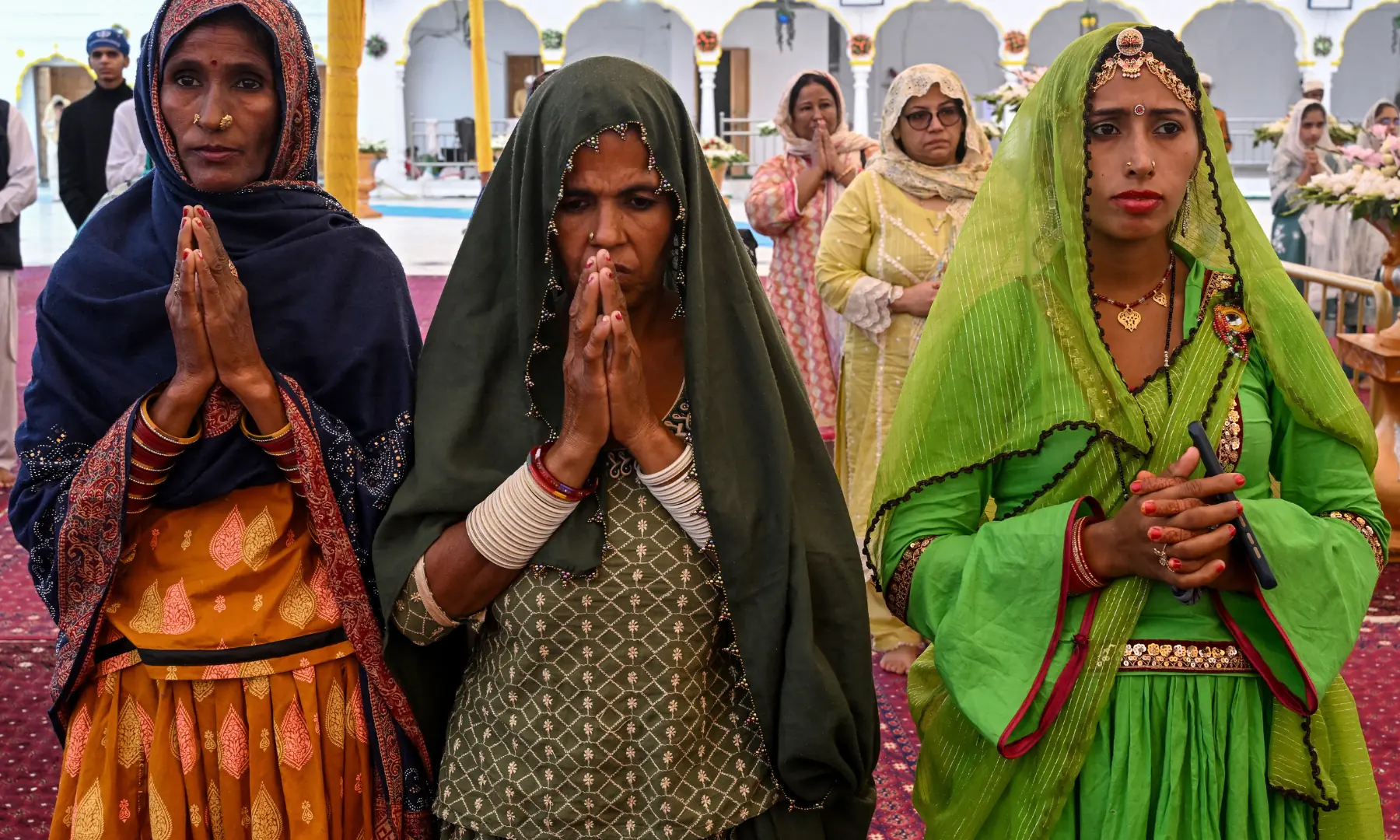 Sikh pilgrims pay homage on the birth anniversary of Guru Nanak Dev, the founder of Sikhism, at Nankana Sahib in Punjab. — AFP