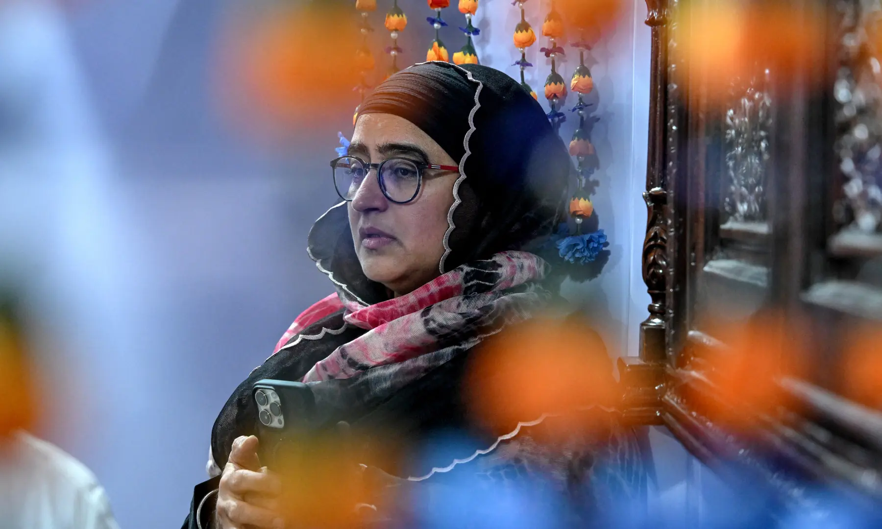 A Sikh pilgrim pays his respects on the birth anniversary of Guru Nanak Dev, the founder of Sikhism, at Nankana Sahib in Punjab. — AFP