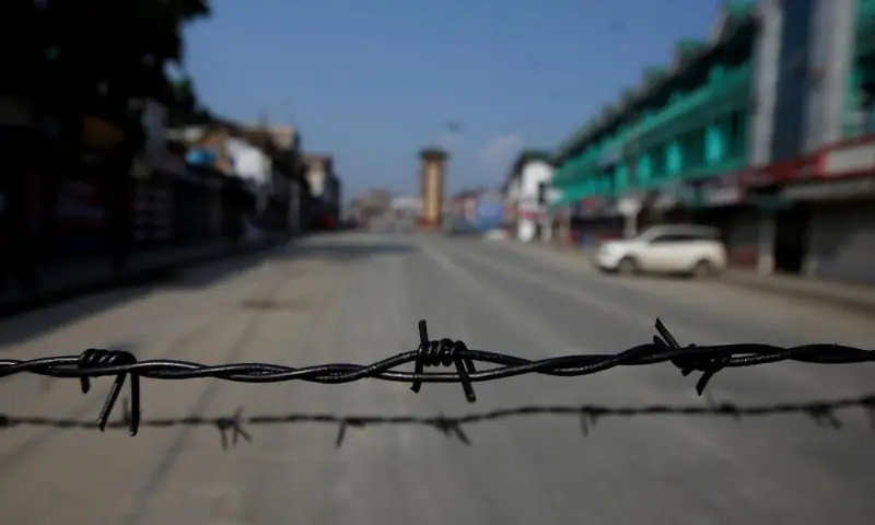 Barbed wire is seen laid on a deserted road during restrictions in Srinagar on Aug 5, 2019. &mdash; Reuters/File