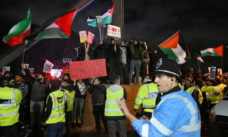General view of police officers as protesters with Palestine flags and banners are seen outside the stadium before the match, Aston Villa v Maccabi Tel Aviv, at Villa Park, Birmingham, Britain on November 6, 2025. &mdash; Reuters