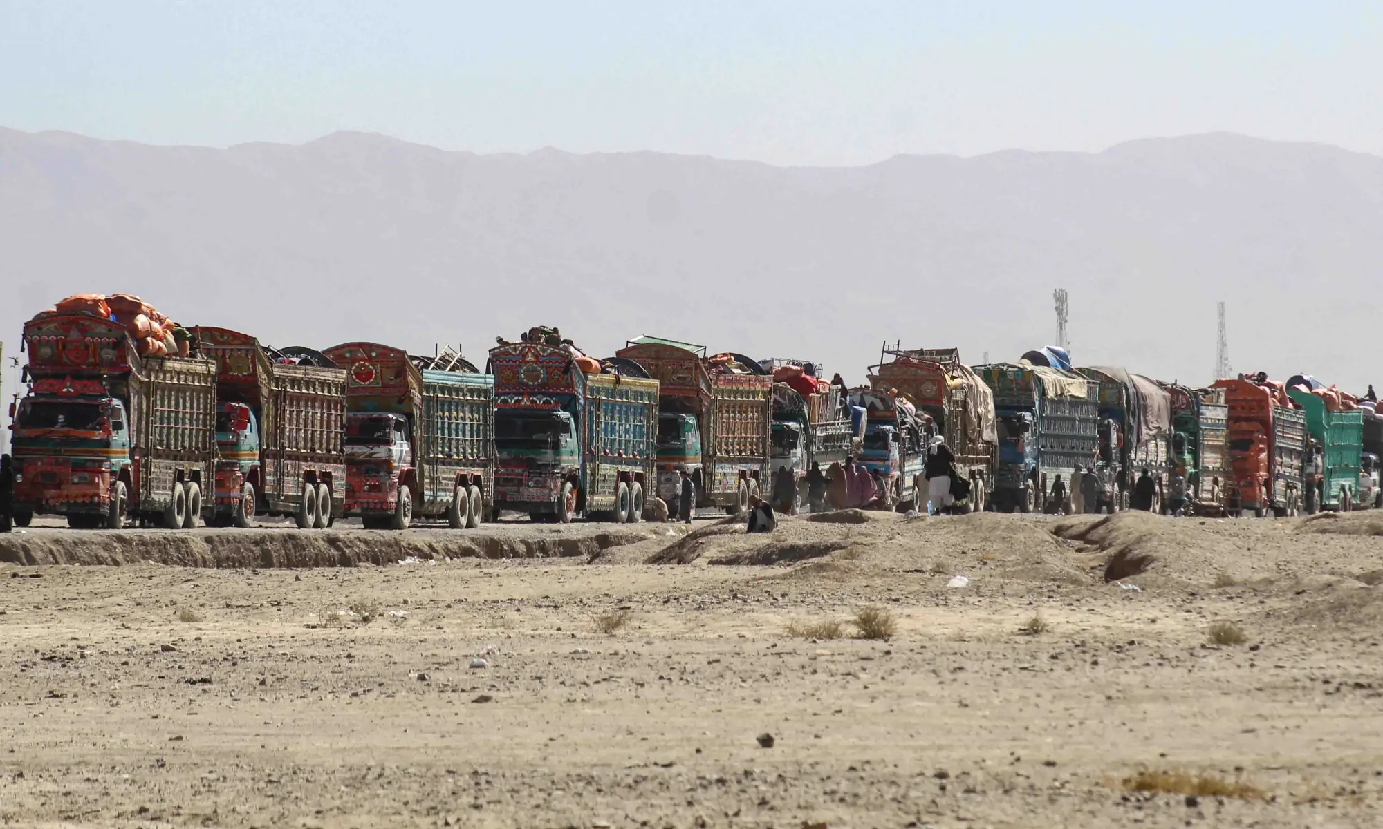 Trucks carrying Afghan refugees and their belongings are seen near the Pakistan-Afghanistan border in Chaman on November 7, 2025. &mdash; AFP