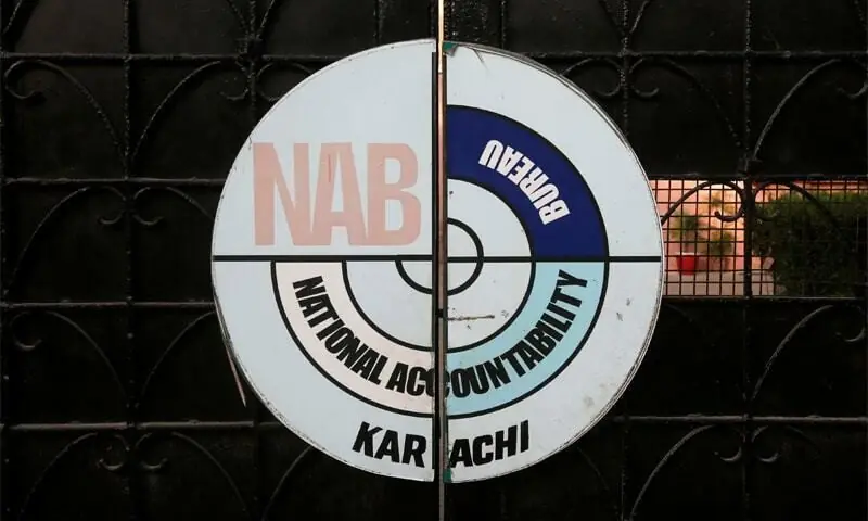 A logo of the National Accountability Bureau (NAB) is seen on the main entrance of their office in Karachi, Pakistan. &mdash; Reuters/File