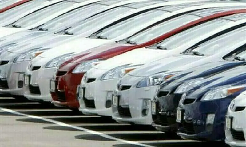 A file photo of a row of auto vehicles. &mdash; Reuters/File