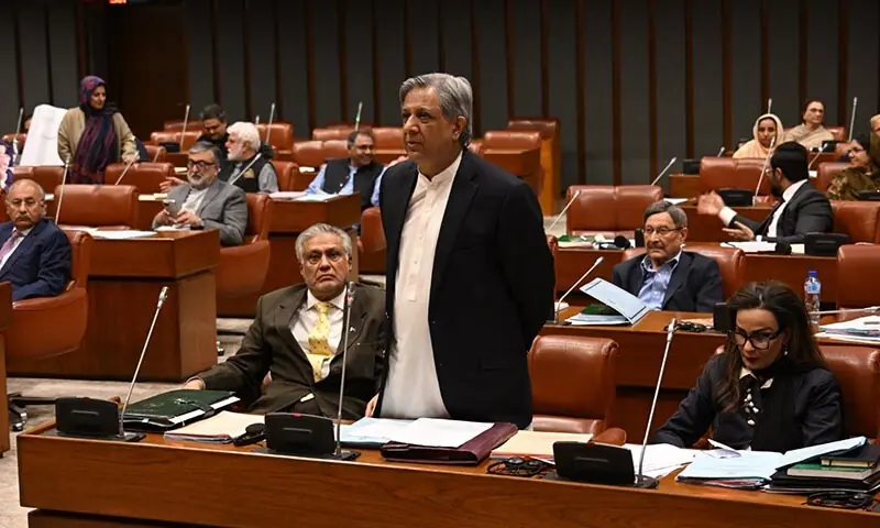 Law Minister Azam Nazeer Tarar speaks in the Senate before a final vote on the 27th Constitution Amendment Bill on November 10. &ndash; White Star